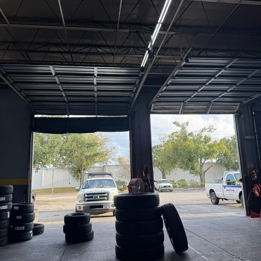 Commercial overhead doors serviced at an auto shop