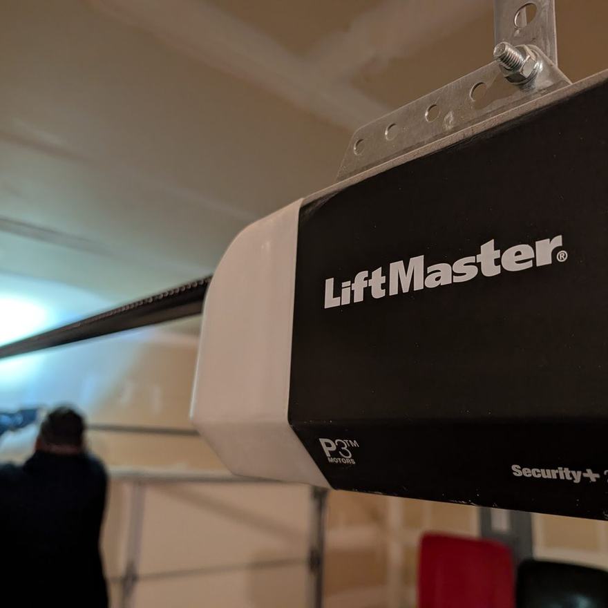LiftMaster Security+ 2.0 garage door opener installed on a garage ceiling